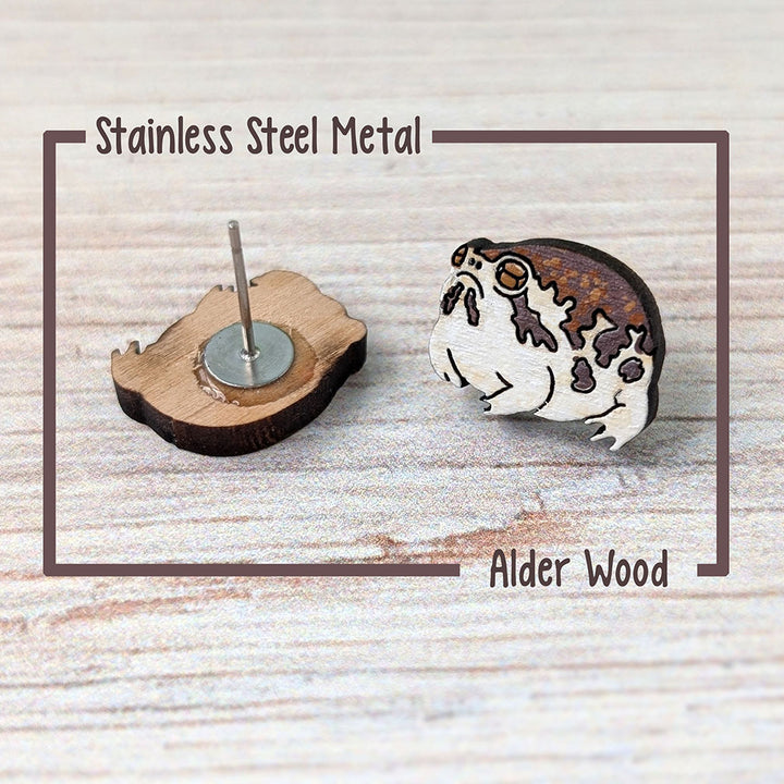 A close up of the desert rain frog showing the rear stainless steel post and the front design with the painted wood design.