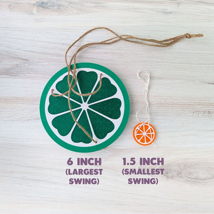 Image on a wood background that shows the largest swing size compared to the smallest.