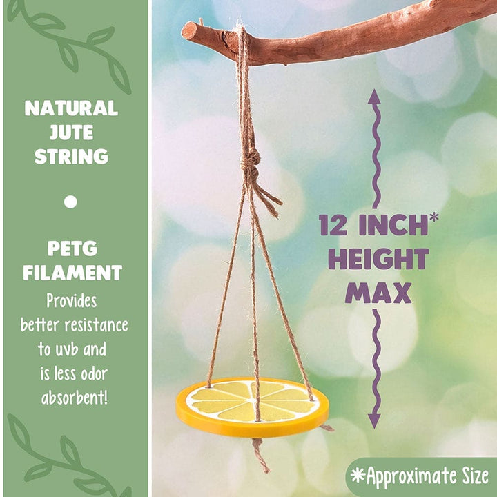 Decorative reptile or frog swing of a plastic lemon slice hanging from a branch with a blurred natural background. Text reads: Natural Jute String and PETG Filament: Provides better resistance to UVB and less odor absorbent.