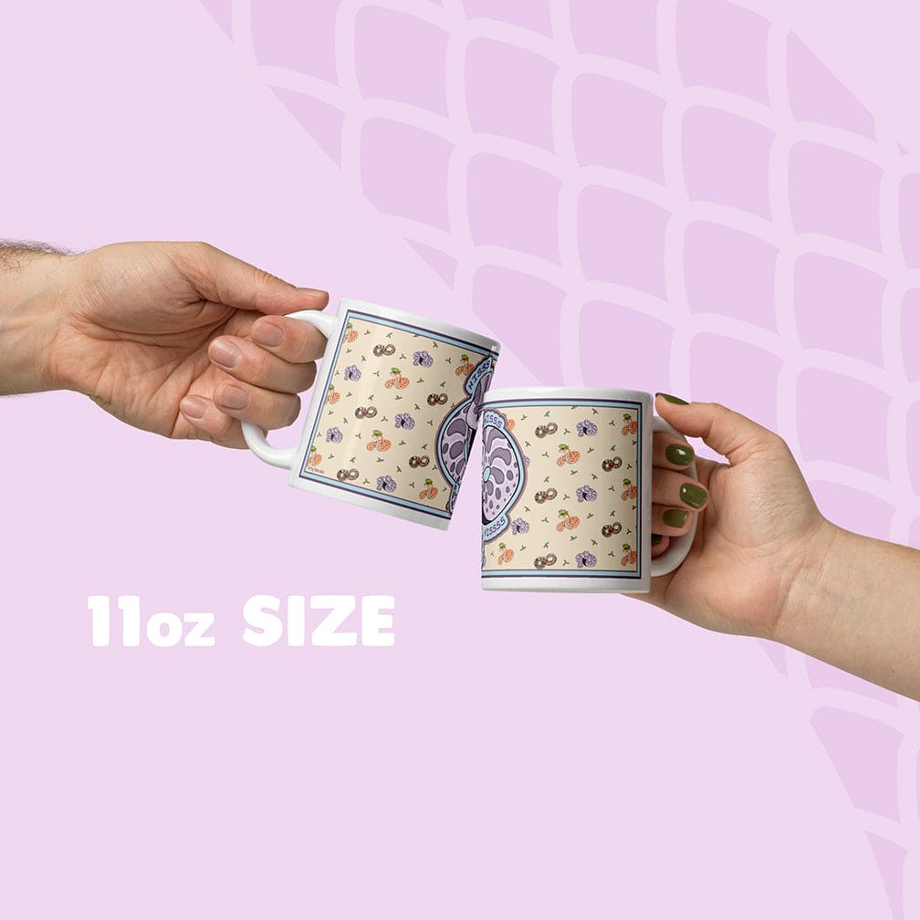 Two hands holding a mug with a pattern against a soft lavender background and a snake scale graphic, labeled '11oz SIZE'.