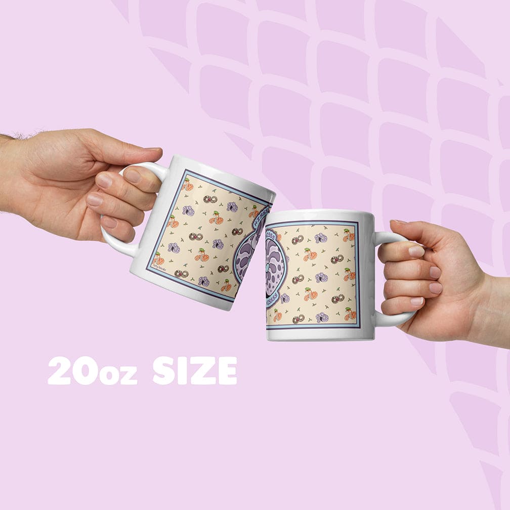 Two hands holding a mug with a pattern against a soft lavender background and a snake scale graphic, labeled '20oz SIZE'.