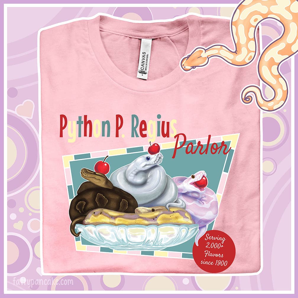 Folded pink crew neck tee showing a retro style design of 4 ball pythons in a banana split boat; one representing chocolate, strawberry, and vanilla ice cream and each topped with a sweet cherry! The text Python P Regius is on top in multi colors.