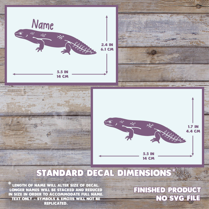 A decal design preview showing a purple lizard silhouette with dimension arrows and text indicating standard decal dimensions. Two versions are shown on a wood plank background, one labeled for a name and one without, with additional text stating finished product no SVG file. Max size is 5.5 inches long by 2.4 inches tall.
