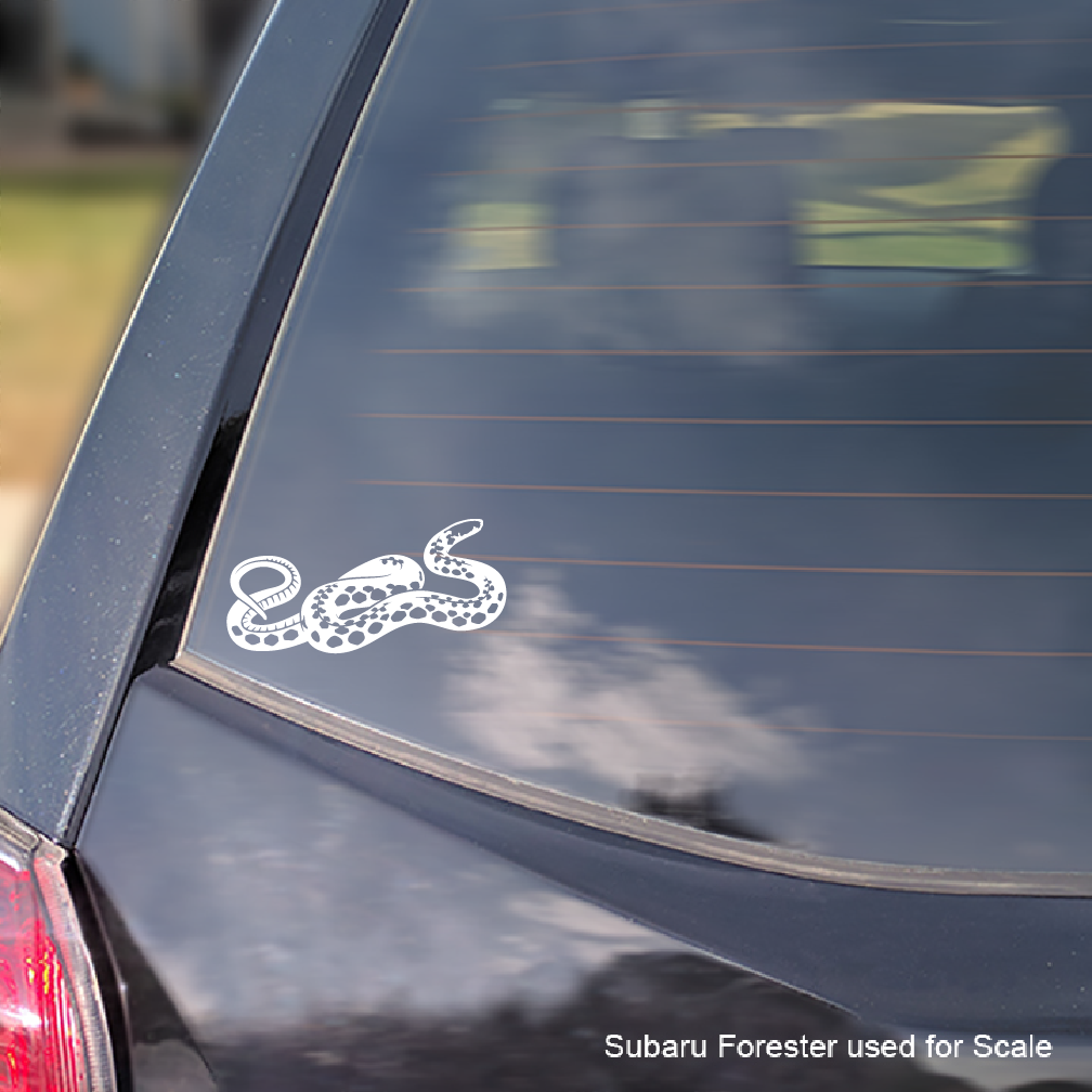 A white vinyl decal of a coiled Kirtland&