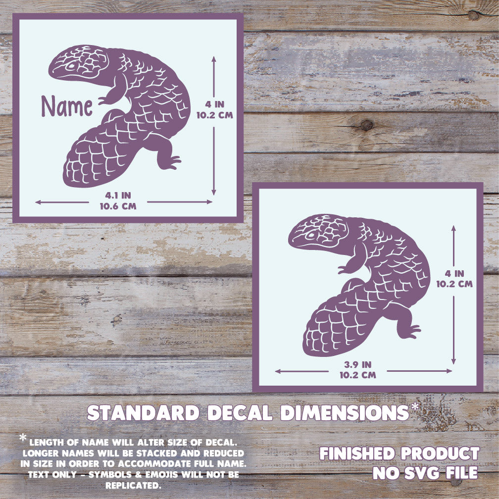 A digital graphic showing two shingleback lizard decals with dimension callouts on a rustic wood background. The decals are white with a purple border and a purple lizard illustration. Size with name is 4.1 inches wide by 4 inches tall.
