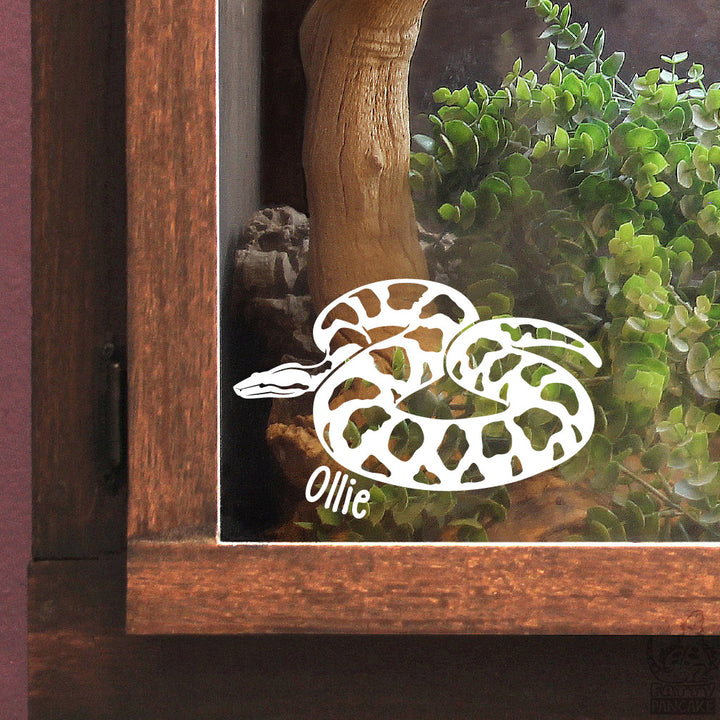 A white vinyl decal of a coiled Viper Boa snake with the name &
