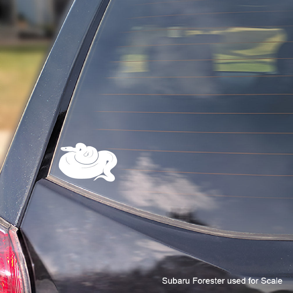 White Ball Python with no pattern vinyl decal on the rear of a car window with text overlay saying "Design as it would appear on car".