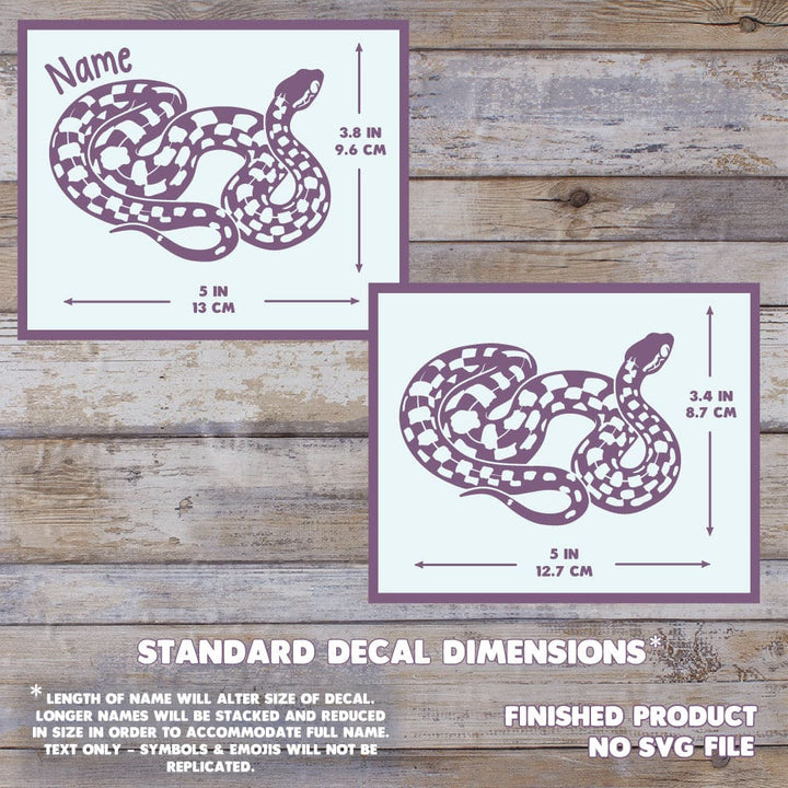 Two images showing the dimensions of the Madagascar Cat-eyed Snake Decal. With a name, it measures 3.8" Tall, by 5" Wide. Without a name, 3.4" Tall by 5" wide. The background has a wooden texture and this is a final product, no digital file is sold.