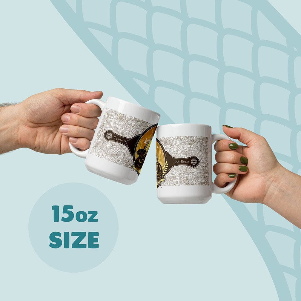 Two white 15oz ceramic mugs featuring a detailed graphic design with a central golden circular emblem, a dark silhouette of a snake, and intricate botanical line art patterns. The text on the mugs includes the words Python and Regius.