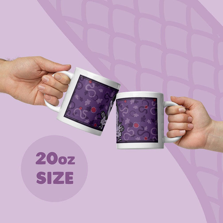 Two hands holding white ceramic mugs with a purple apple and snake pattern, clinking them together on a light purple graphic background with &