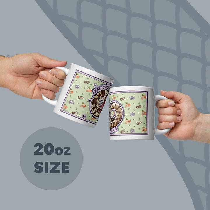 Two hands holding the dramatic hognose 15oz mugs against a gray back ground.