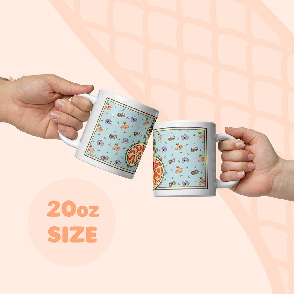 Two hands holding a 20oz mug to display size compared to a human hand.