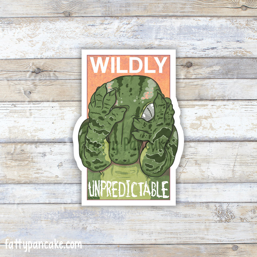 A die-cut sticker featuring a green leachie gecko peeking out from behind it&
