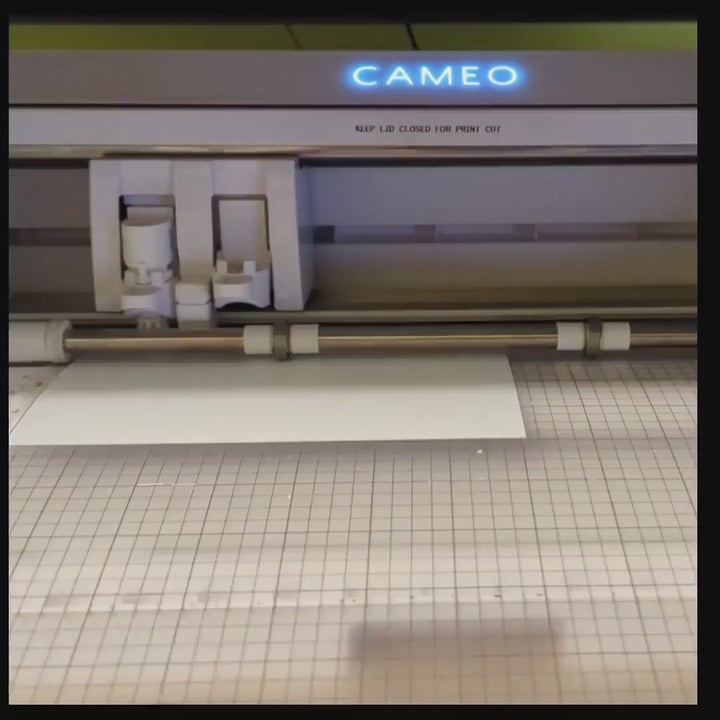 Video showing how decals are made. First the design is cut via a vinyl cutter, then the design is weeded, then a transfer layer is applied, then the product is trimmed. updated#gid://shopify/Video/38911097602348#video_id