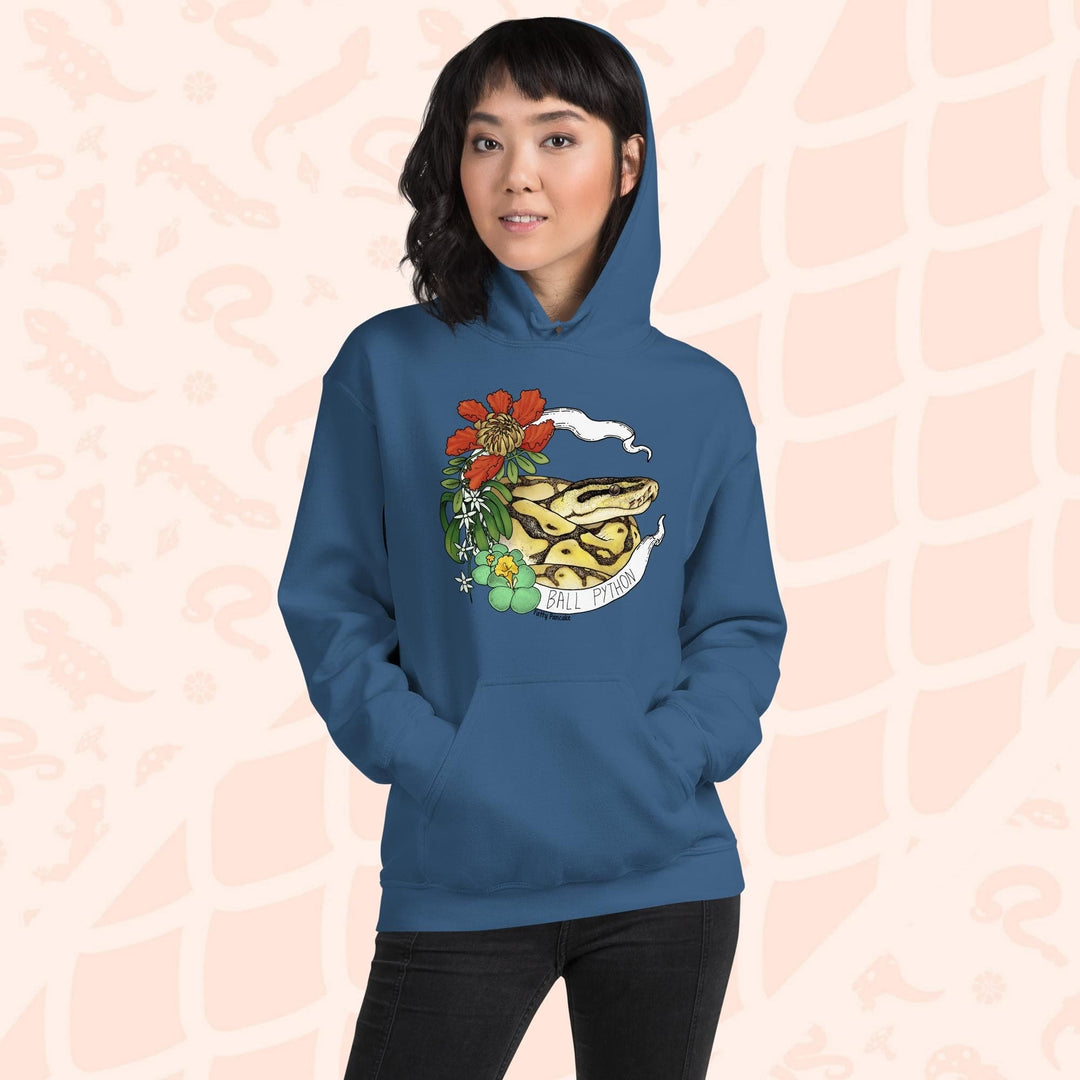 A  neutral blue hoodie with a graphic of a ball python snake with flowers and the text "Ball Python" on a white banner.