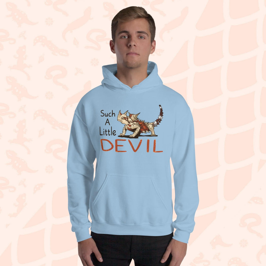 A soft light blue hoodie with a cartoon Australian Thorny Devil lizard. It is very spiny and has a grouchy face, with tan and red colors and facing left with large text to it's left that states "Such A Little DEVIL" printed on the front. The hoodie is soft cotton with a front pouch.