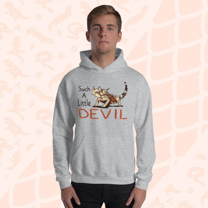 A gray hoodie with a cartoon Australian Thorny Devil lizard. It is very spiny and has a grouchy face, with tan and red colors and facing left with large text to it's left that states "Such A Little DEVIL" printed on the front. The hoodie is soft cotton with a front pouch.