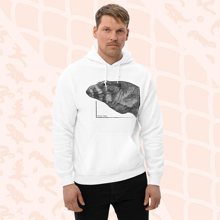 A man wearing a white pullover hoodie with a graphic print of a pencil drawing of a lace monitor lizard. It's a profile view and highly detailed showing a close up of the scales. The hoodie has a front pocket.