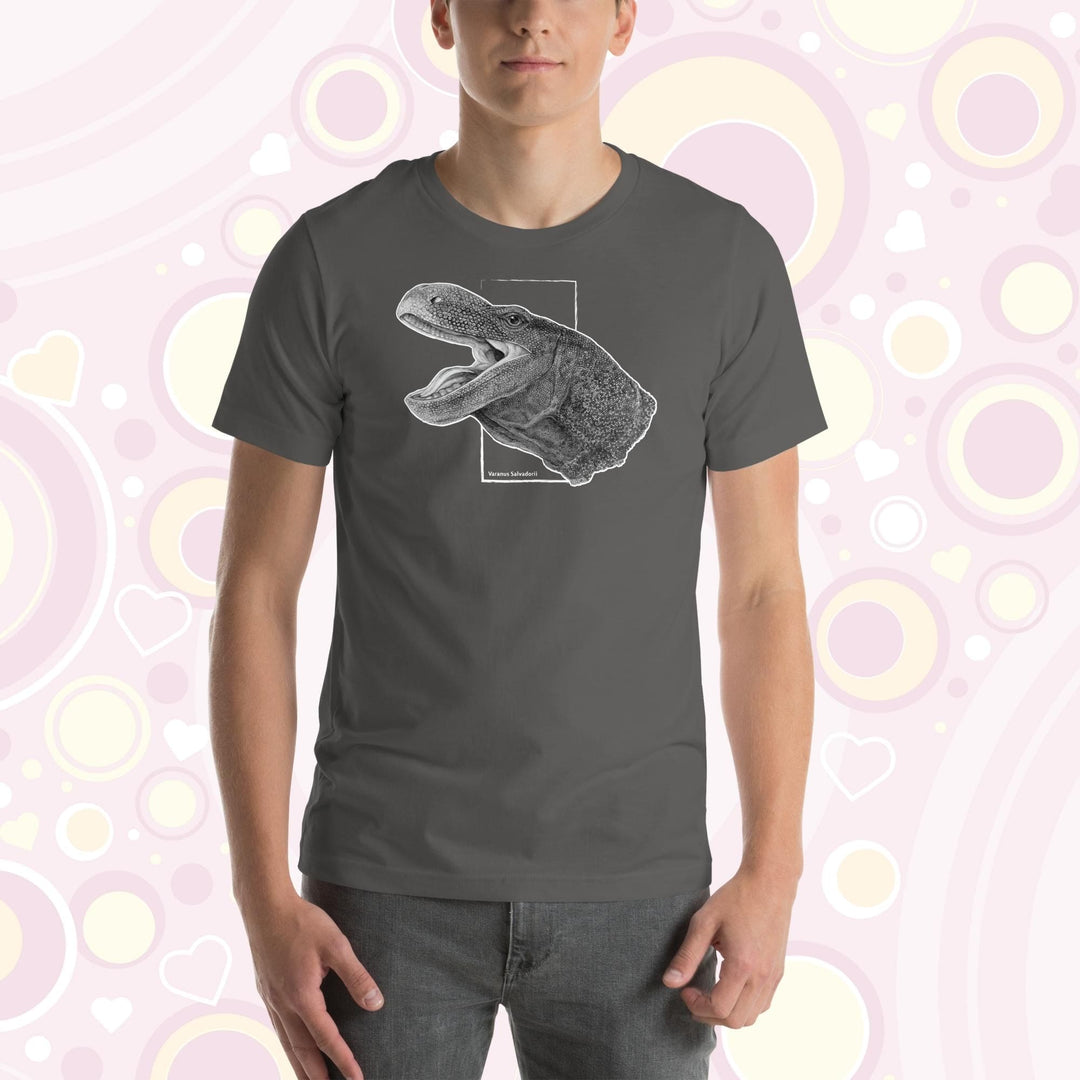 A man wearing a asphalt grey crew neck tee with a black and white detailed drawing of a crocodile monitor head and neck.