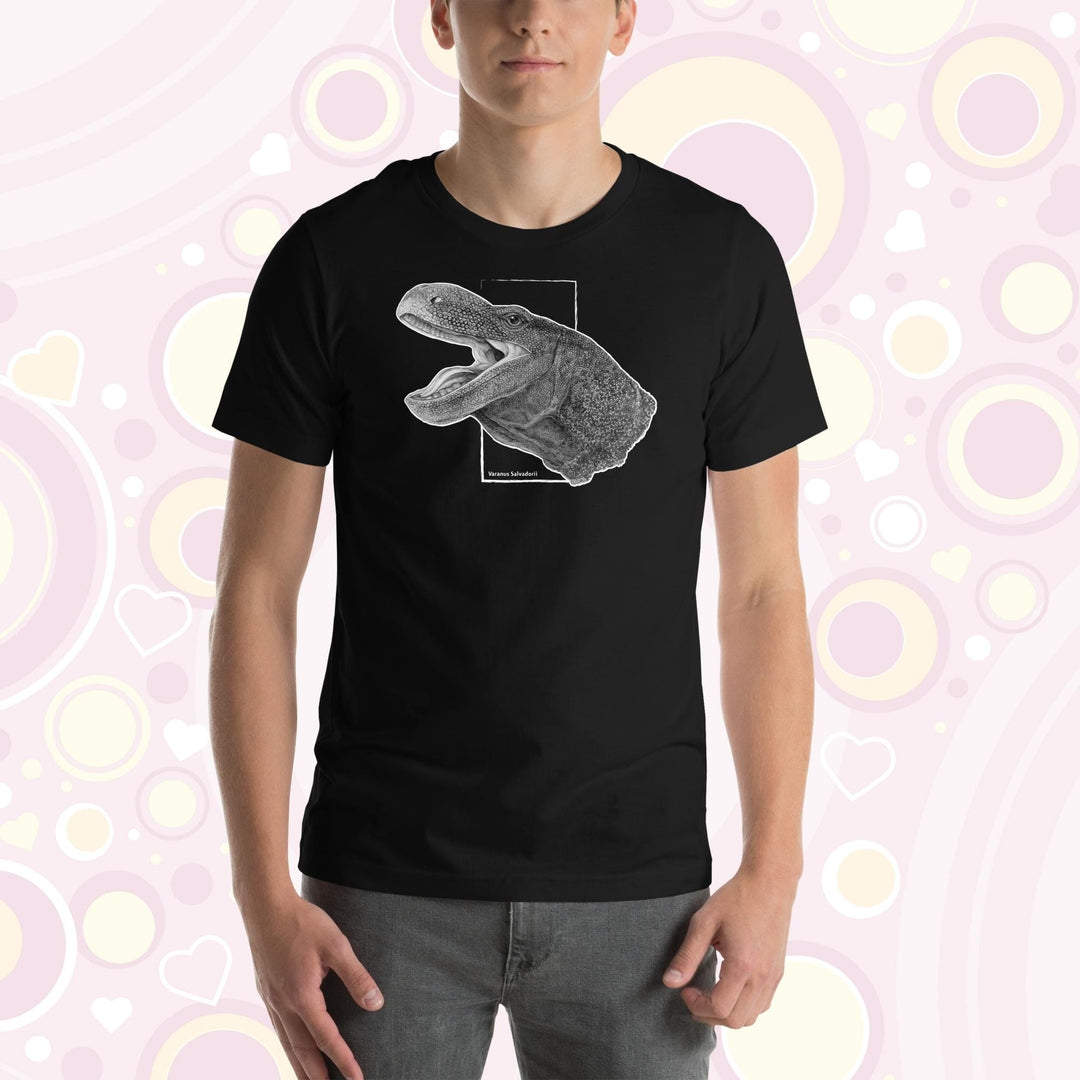 A man wearing a black crew neck tee with a black and white detailed drawing of a crocodile monitor head and neck.