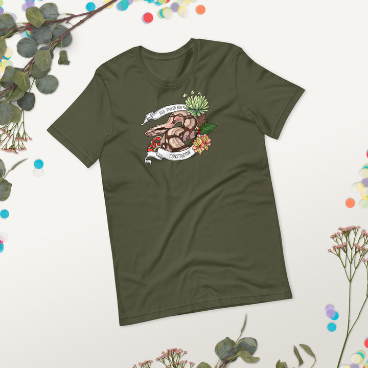 Green t-shirt with a graphic of a red-tailed boa constrictor on a light background with decorative elements.