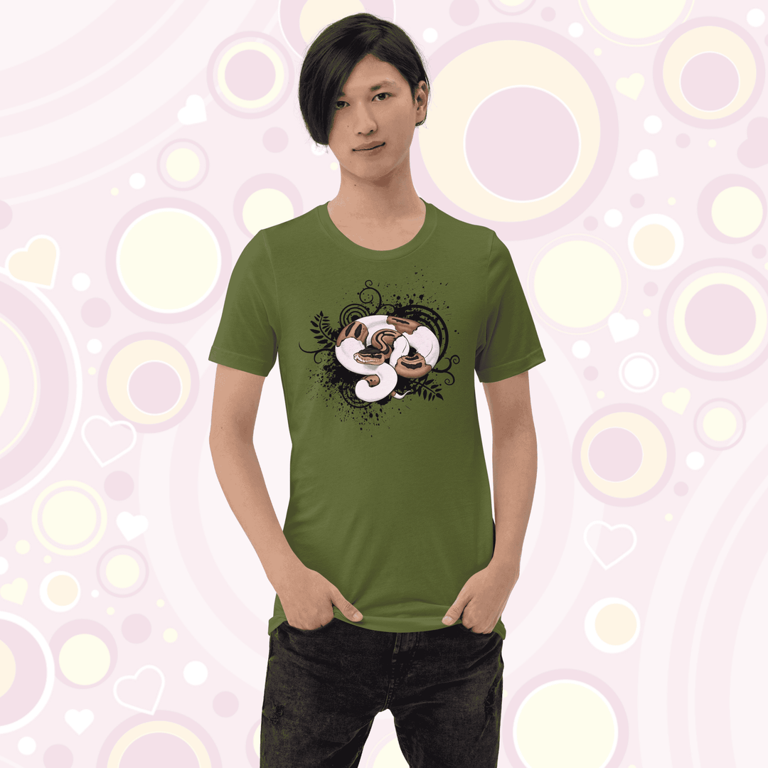 Young adult wearing olive colored crew neck tee with a pied ball python graphic with simple black swirls, leaves, and spatter marks behind it.