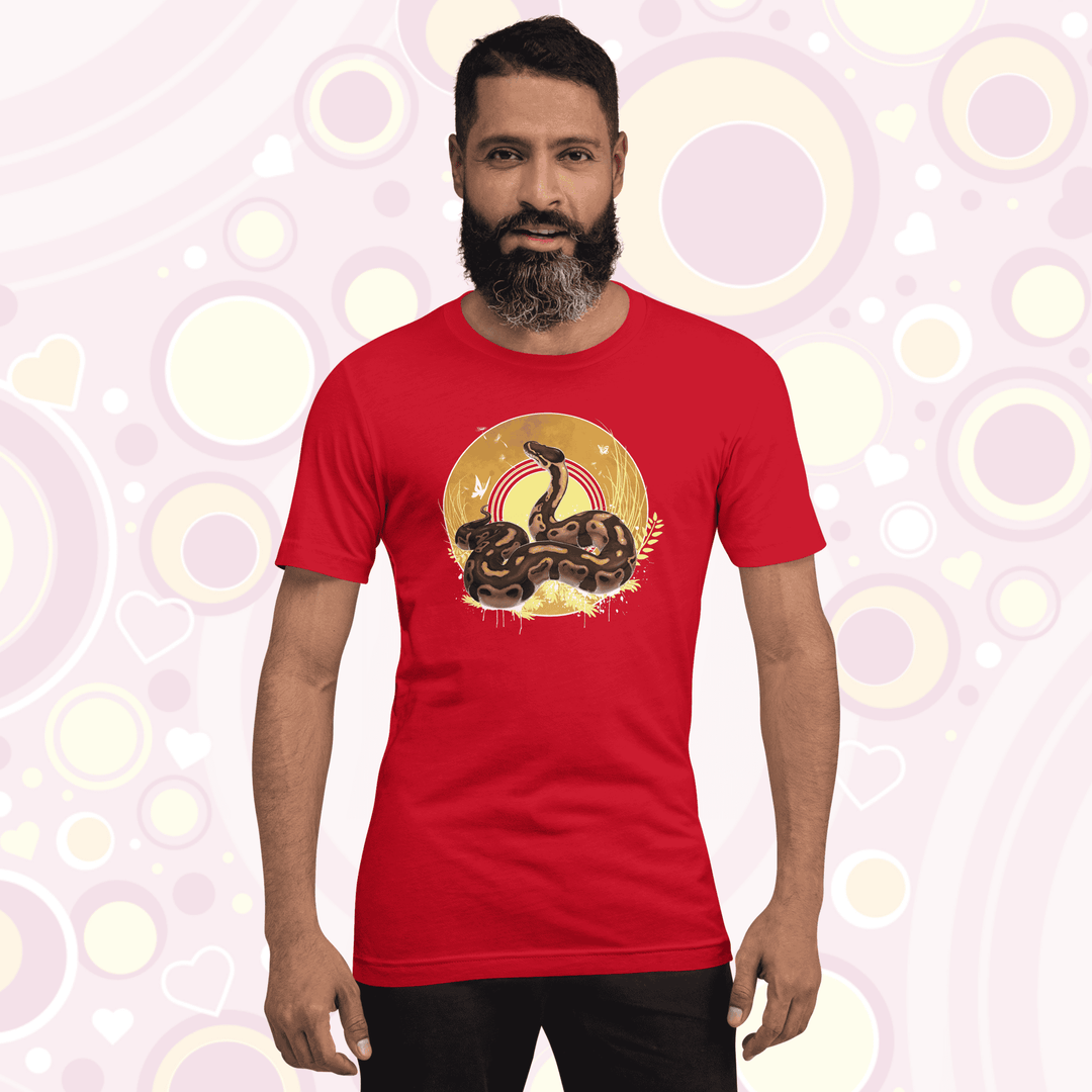 Man wearing red colored crew neck tee with a ball python resting atop of a circle with warm amber colors of fall with simple yellow leaf designs.