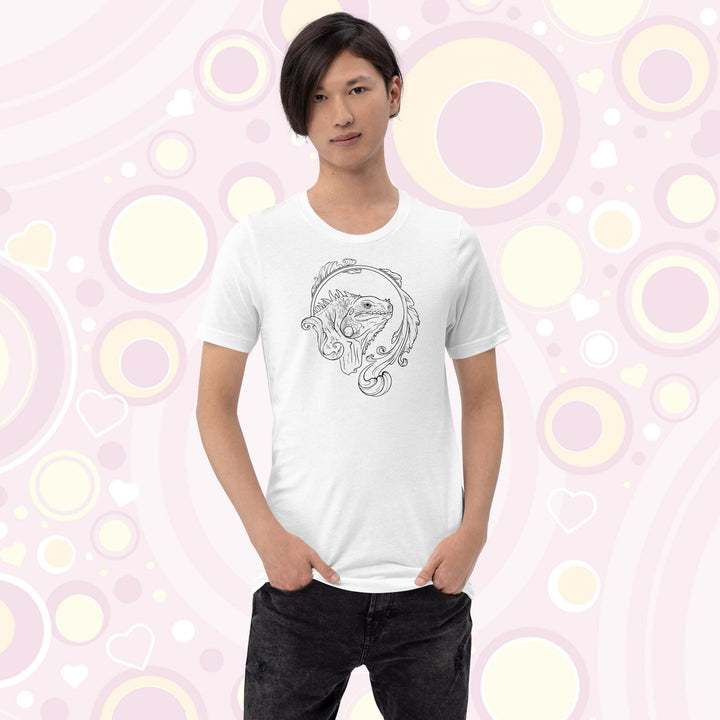 Teen wearing a white crew neck tee with a black and white line art graphic of an iguana with an elegant flourish design swirling around the animal.