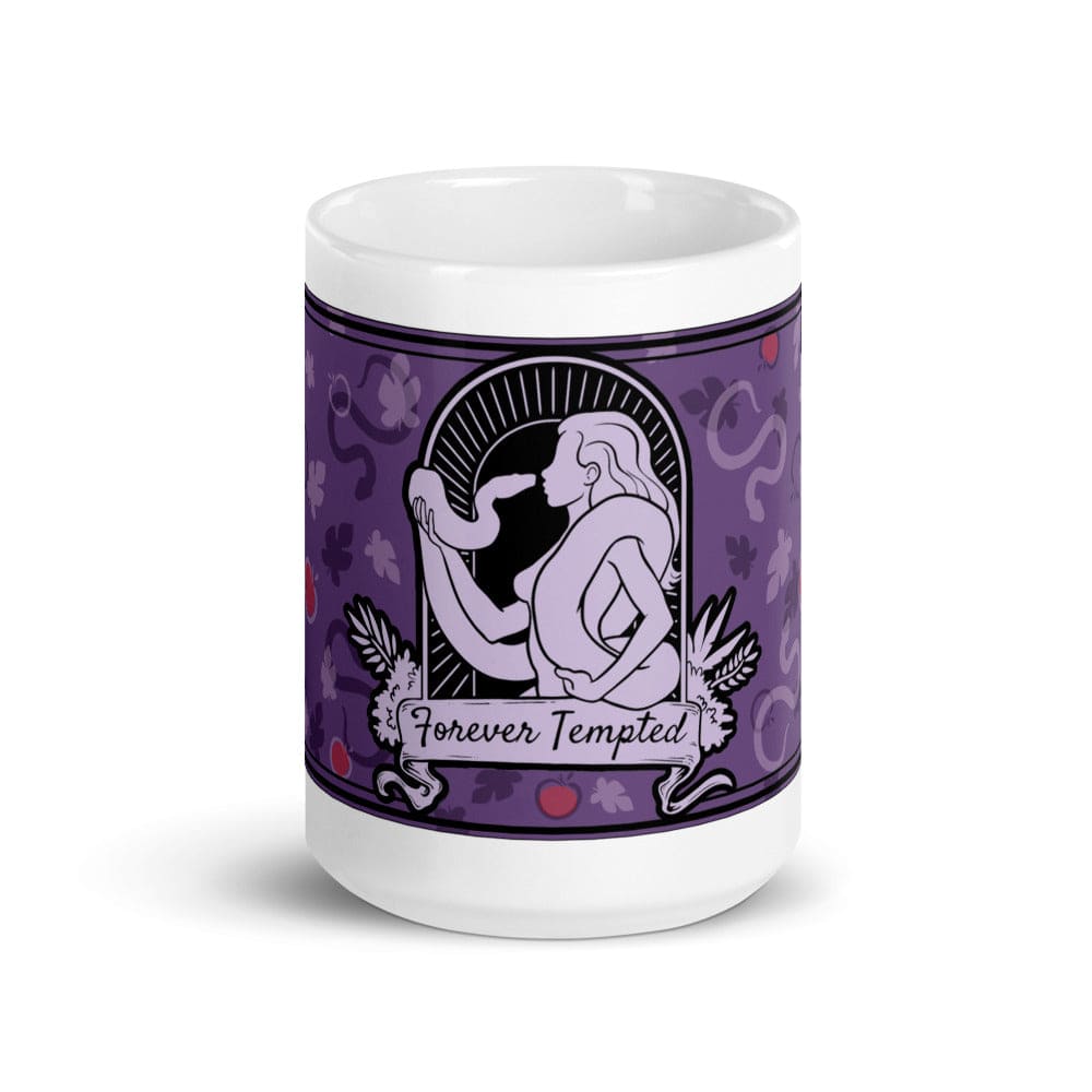 A 15oz white ceramic mug featuring a purple graphic illustration of a figure holding a snake within an arched frame. The text Forever Tempted is printed on a banner below the figure, surrounded by a pattern of leaves and red apples.