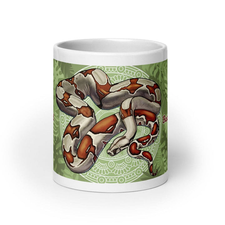 A 20oz ceramic mug with a colorful illustration of a red tail boa constrictor snake. This shows the front of the mug.