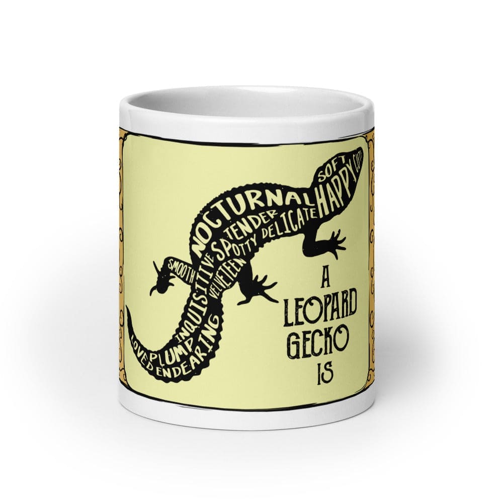 A white 20oz ceramic mug featuring a central pale yellow rectangular panel with a black silhouette of a leopard gecko. The gecko&