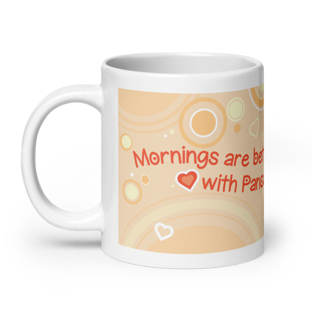 A white ceramic mug featuring a printed graphic with the text &