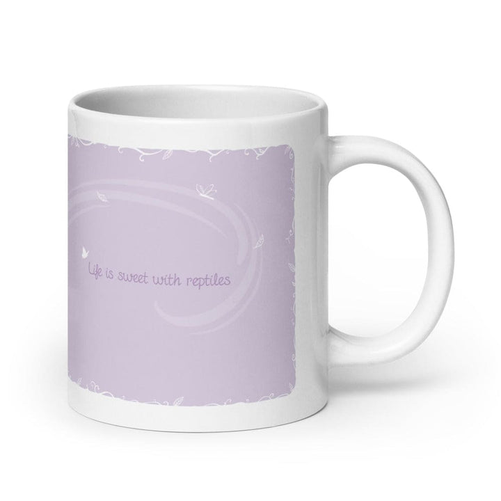 A white ceramic mug featuring a lavender purple printed graphic with the text &